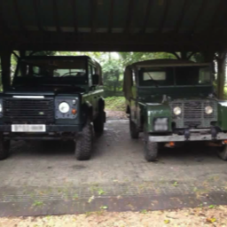 two old land rovers