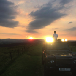land rover with sunset